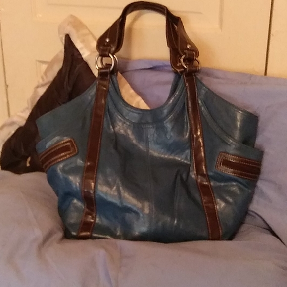 Handbags - A blue purse.